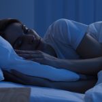 woman sleeping in bed