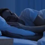woman sleeping in bed